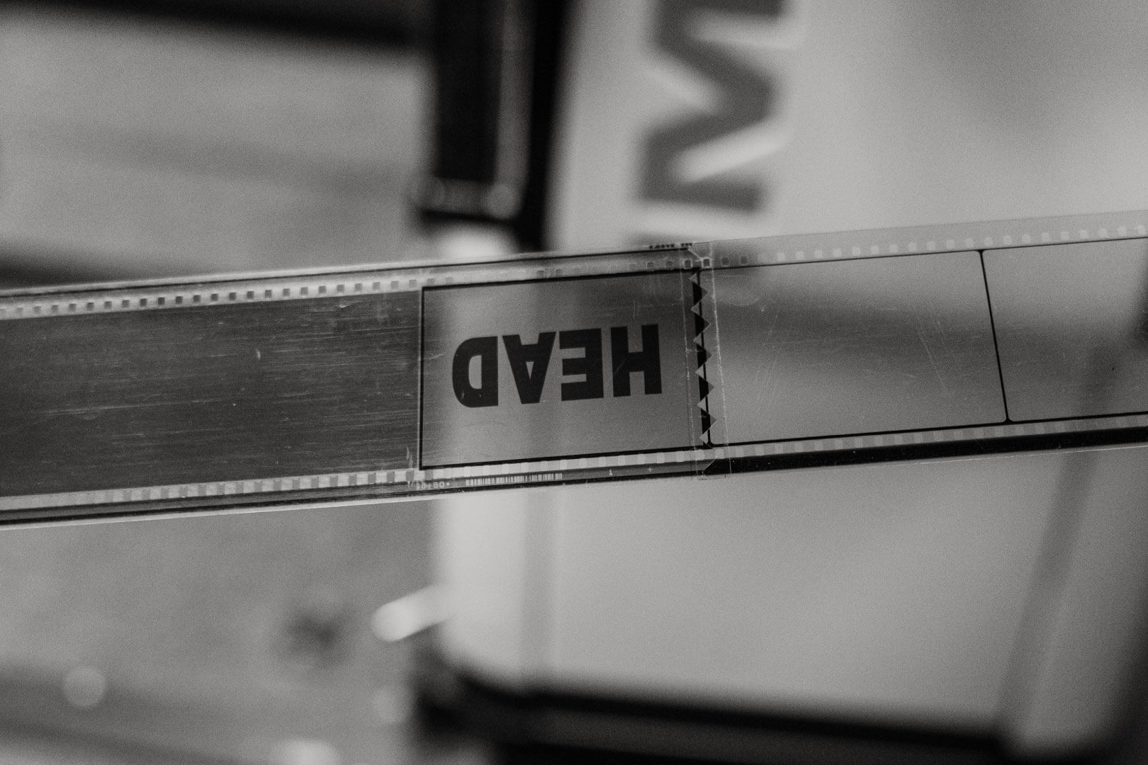 A projectionist preparing the IMAX 70MM film
